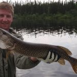 Man holding a pike