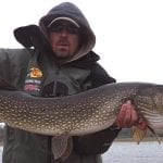 Man holding a pike